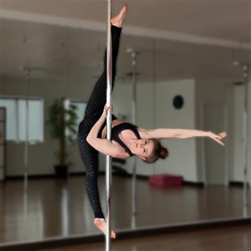 Photo of the pole dance move Plus Sign